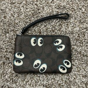 Corner Zip Wristlet In Signature Canvas With Halloween Eyes